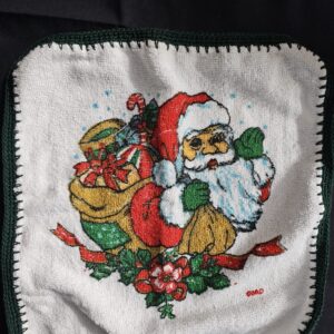 White Toweling Washer with Santa Image with Green Crochet Edge