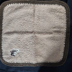 Tan Toweling Washer with Embroidered Flower with Brown Crochet Edge