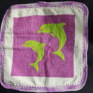 Cream and Pink Toweling Washer with Green Dolphins and Varigated Pink Crochet Edge