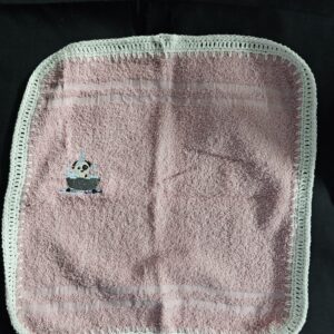 Pink Toweling Washer with Embroidered Dog in Bath and White Crochet Edge