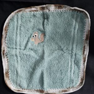 Green Toweling Washer with Embroidered Squirrel and Varigated White and Brown Crochet Edge