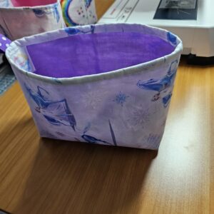Small Frozen Fabric Basket with Purple Lining and Clips