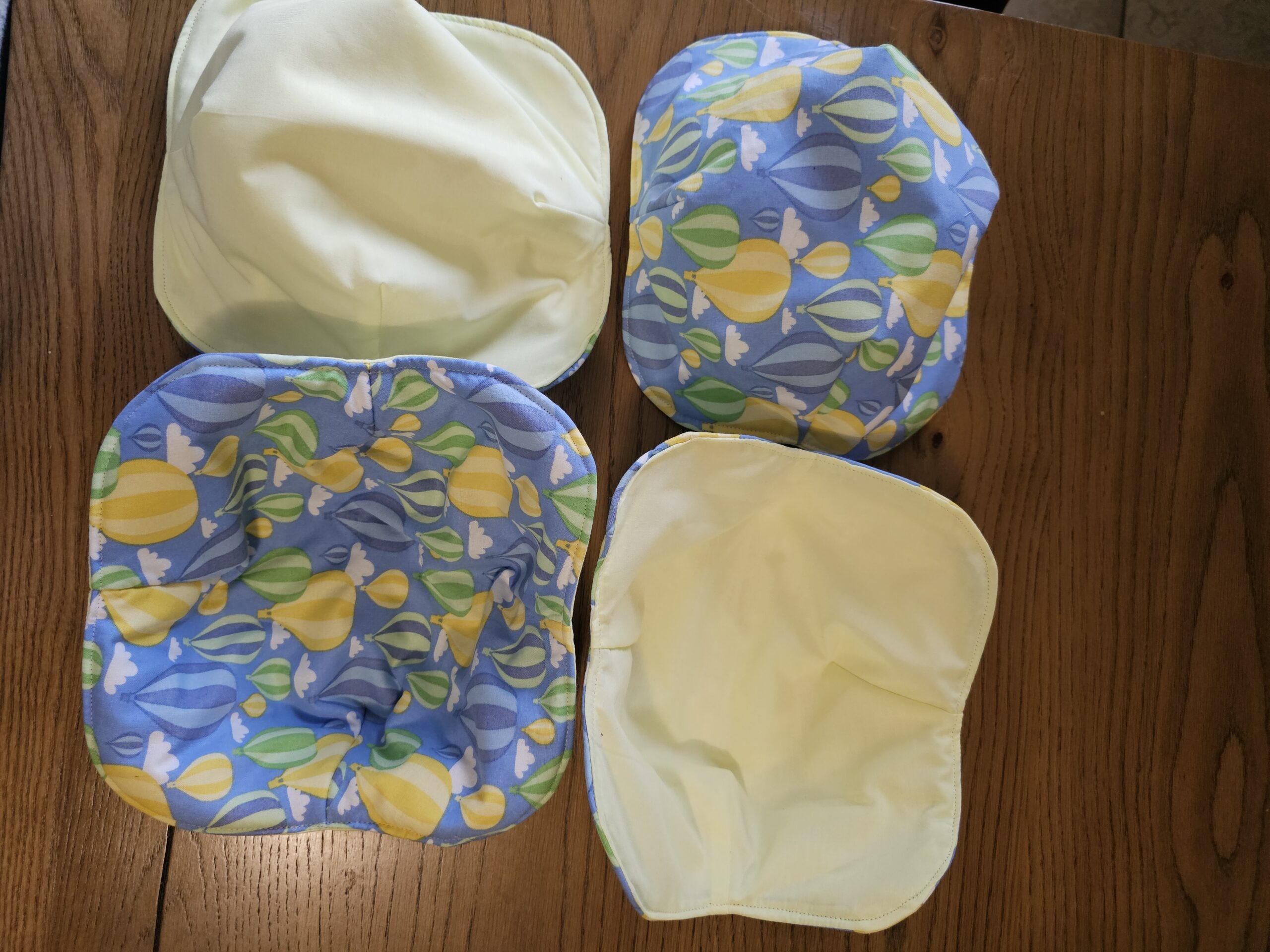 Multi Colour Hot Air Baloons/Yellow Fabric - Reversible Bowls Holders - Large - Single Units