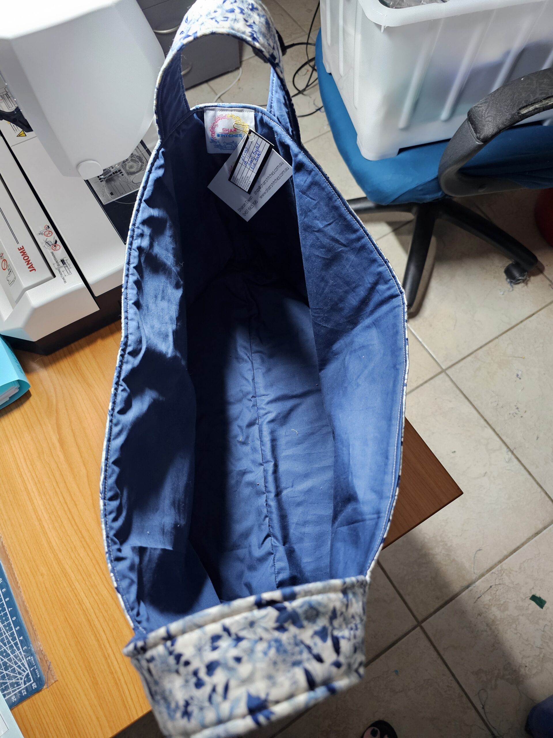 Large Fabric Basket with Blue Flowers and Handles with Blue Lining - Image 3