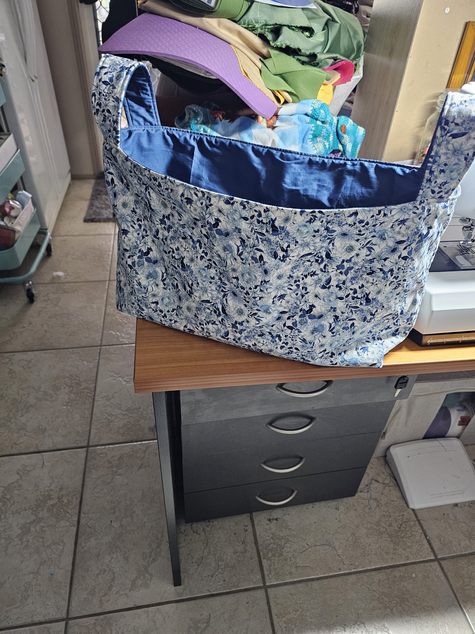 Large Fabric Basket with Blue Flowers and Handles with Blue Lining - Image 5